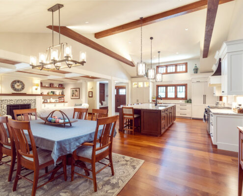 great room addition and dining and kitchen with timber beams