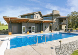 swimming pool and rustic pool house