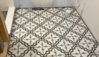 black and white tile floor in bathroom