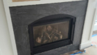 dark gray accent tile on fireplace